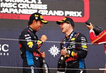 Checo Pérez celebrates with Red Bull teammate and race winner Max Verstappen in Japan