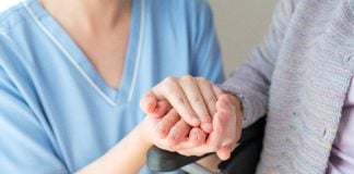 Young nurse with an elderly patient