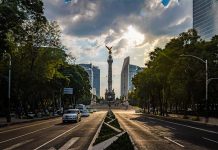 A long perspective view of Reforma Avenue in Mexico City