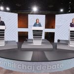 Mexico's presidential candidates at lecterns in a debate