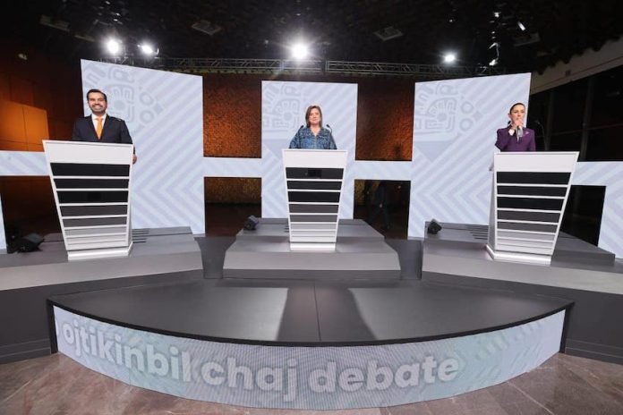Mexico's presidential candidates at lecterns in a debate
