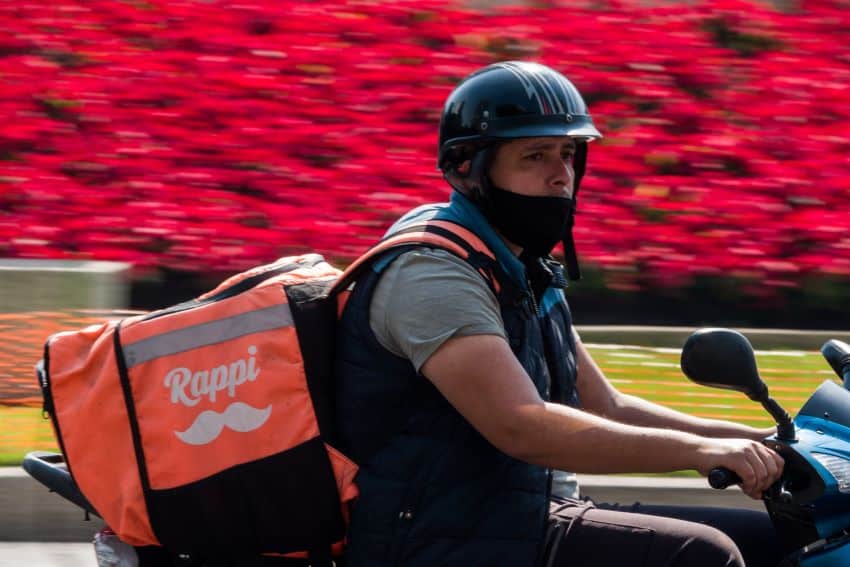 A gig worker delivers an order made on the Rappi app in Mexico