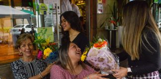 Families gather in a restaurant to celebrate Mother's Day in Mexico, in 2022.