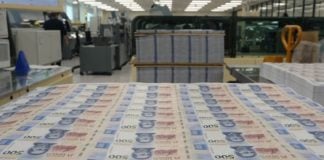 Mexican pesos being printed in a mint