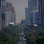 hazy Mexico City skyline with view of the Independence Angel