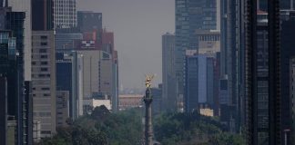 hazy Mexico City skyline with view of the Independence Angel