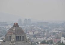 Mexico City skyline under heavy air pollution obscuring the view