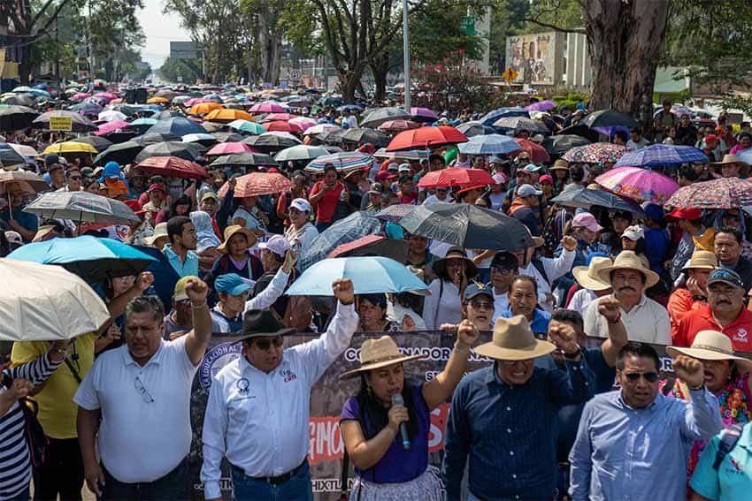 CNTE union marching for pay hikes for teachers in Mexico in Oaxaca city