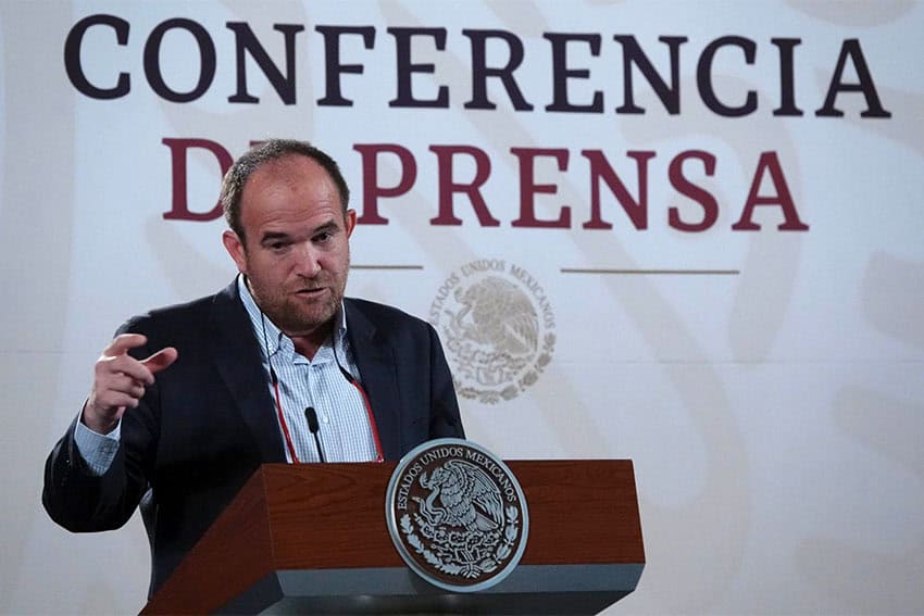 Ruy Lopez Ridaura, a sub-deputy with the Health Ministry, stands at a podium talks to reporters about Mexico heat wave preparations during President Lopez Obrador's daily press conference