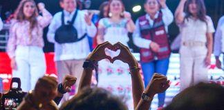 People cheer at a campaign rally in Yucatán