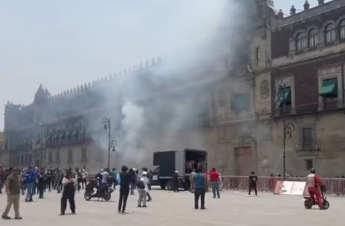 Protesters launched fireworks and rockets at Mexico's National Palace on Monday.