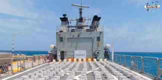 The boat where the Navy found the supposed cocaine also carried three people and 18 drums of a petroleum product.