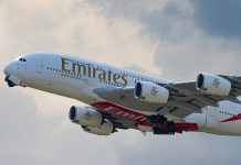 An Emirates plane mid-flight