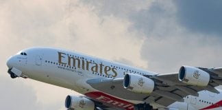 An Emirates plane mid-flight