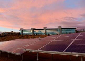 Photo of a solar panel during the sunset