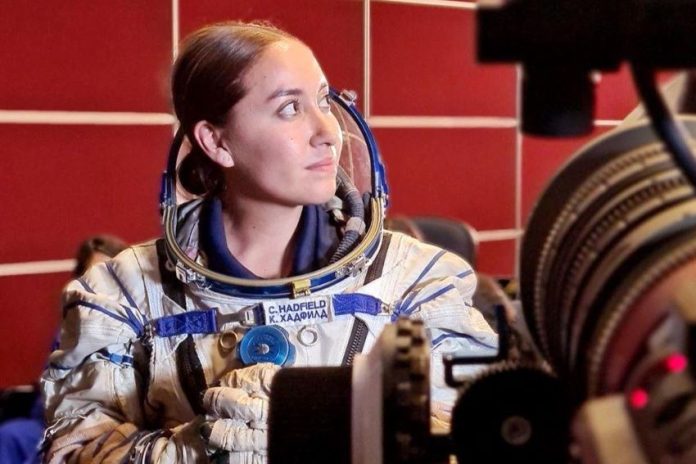 Katya Echazarreta using a Space suit