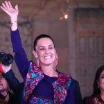 Claudia Sheinbaum waves to the crowd in Mexico City