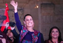 Claudia Sheinbaum waves to the crowd in Mexico City