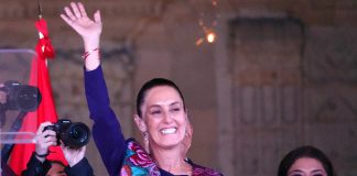 Claudia Sheinbaum waves to the crowd in Mexico City