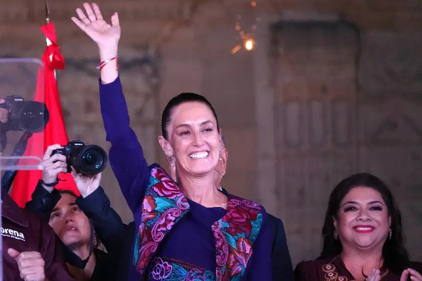 Claudia Sheinbaum waves to the crowd in Mexico City