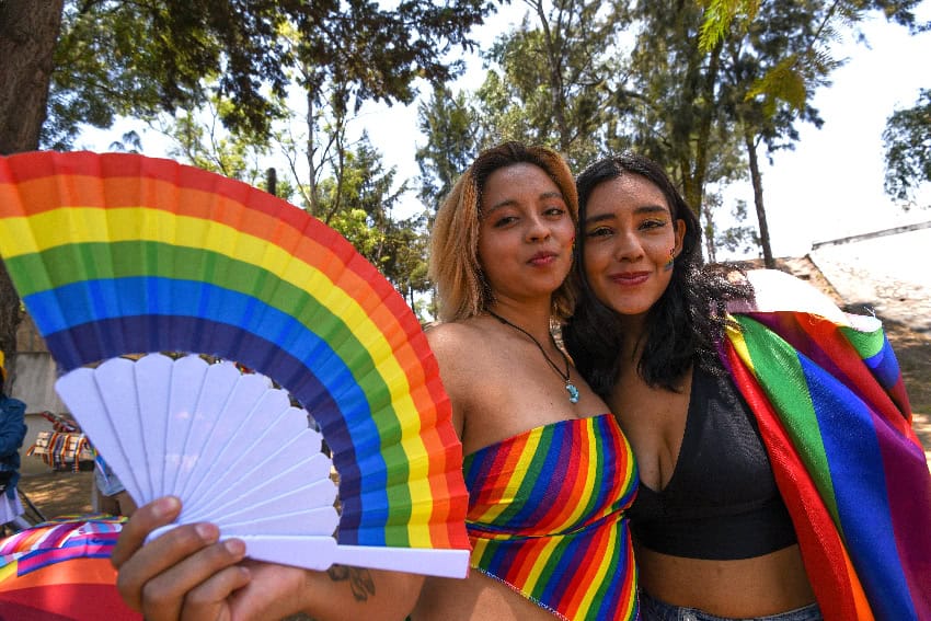 Two women at a pride parade in México state