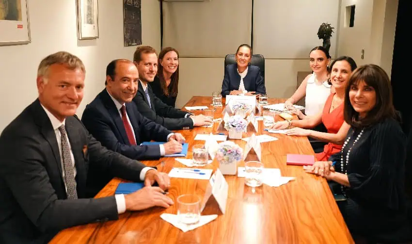 Claudia Sheinbaum with Walmart Mexico executives at a conference table
