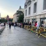 Mexican nationals wait in line in Madrid to cast their vote in person for the country's first female president