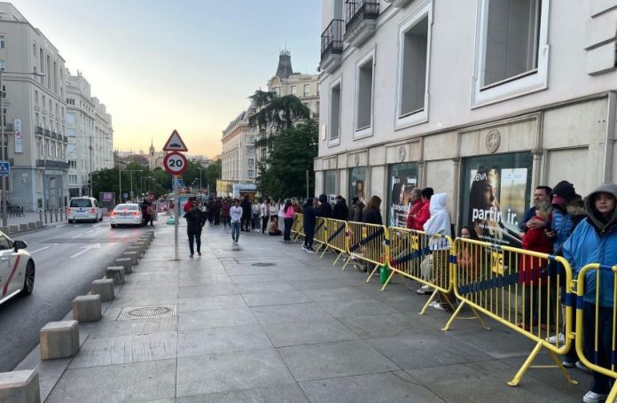 Mexican nationals wait in line in Madrid to cast their vote in person for the country's first female president