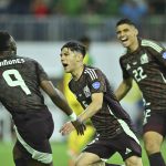 Mexico's men's national soccer team celebrating a win against Jamaica