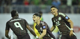 Mexico's men's national soccer team celebrating a win against Jamaica