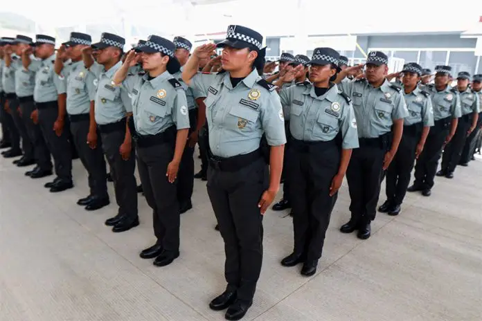 National Guard members salute during the inauguration of new facilities in Oaxaca on Sunday.