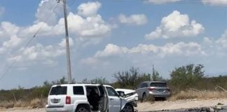 Two damaged SUVs after a car accident.