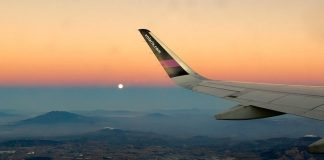 A Volaris plane flying over Mexico