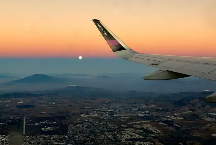 A Volaris plane flying over Mexico