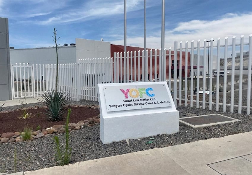 A sign for the Mexican branch of the company YOFC, a telecoms manufacturer with a new plant in Mexico.