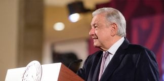 President Lopez Obrador at a podium in the National Palace