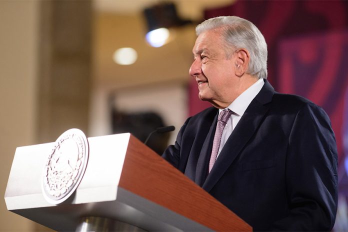 President Lopez Obrador at a podium in the National Palace