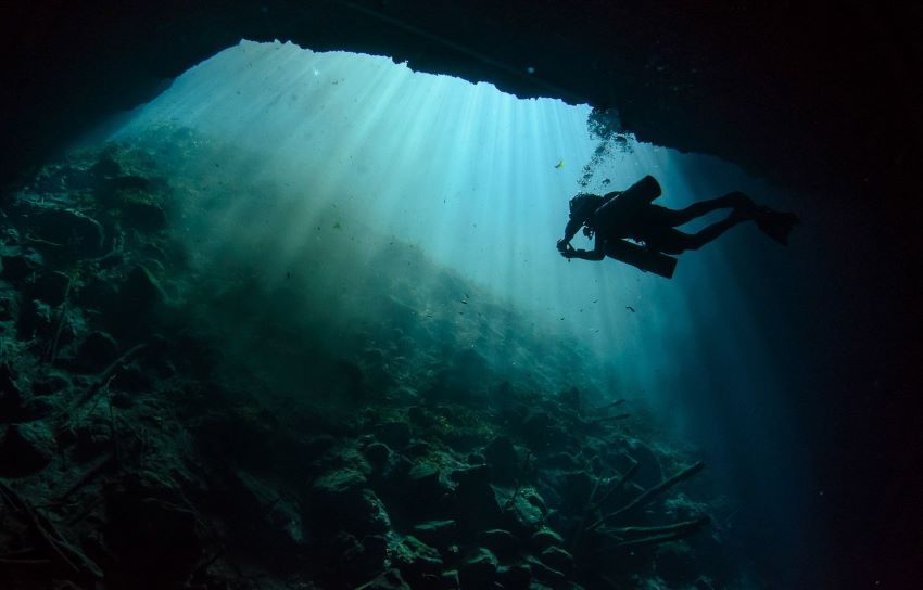 A diver in the Xlacah cenote