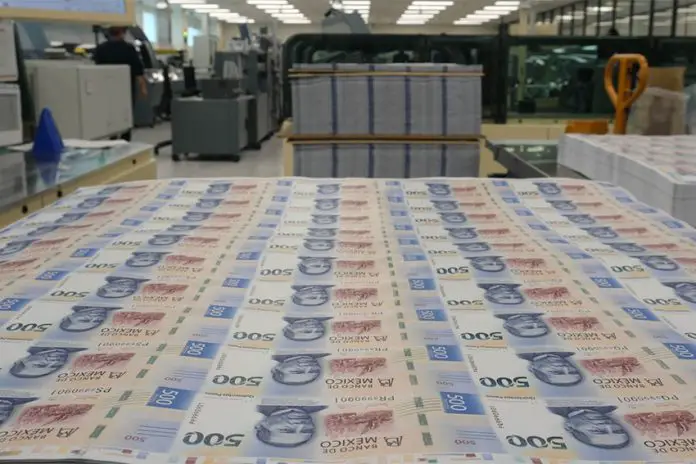 Rows of 500 peso bills just printed in Mexico's currency minting facilities.s