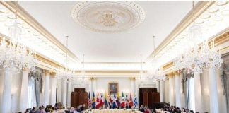 Ministerial meeting of the Americas Partnership for Economic Prosperity, with member country representatives seated at banquet tables in a foermal room at the US White House.