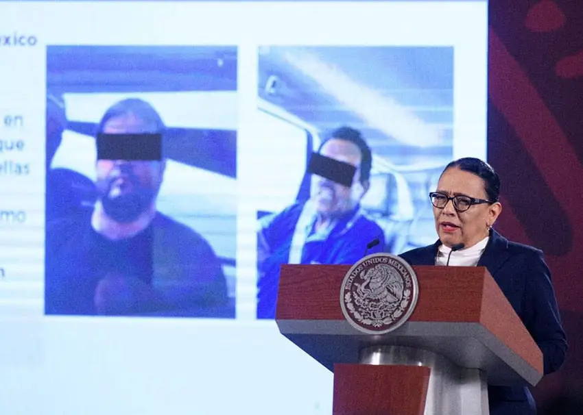 Security Minister Rosa Icela Rodríguez with photos of El Mayo and López Guzmán in the background