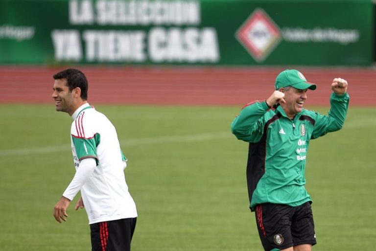 From left to right: Mexican soccer star Rafa Marquez and coach Javier Aguirre on a soccer pitch in a previous World Cup