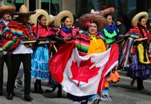Mexicans with a Canadian flag