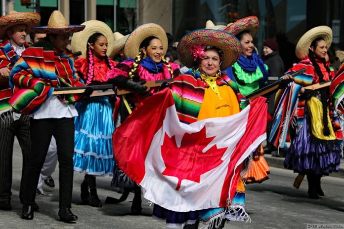 Mexicans with a Canadian flag