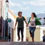 A date skipping through the street