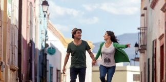 A date skipping through the street