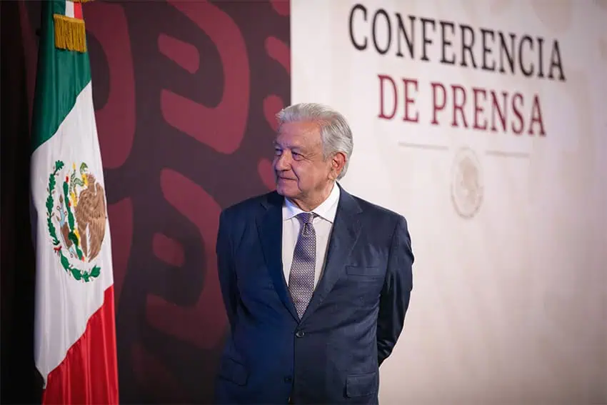 President López Obrador stands at a podium