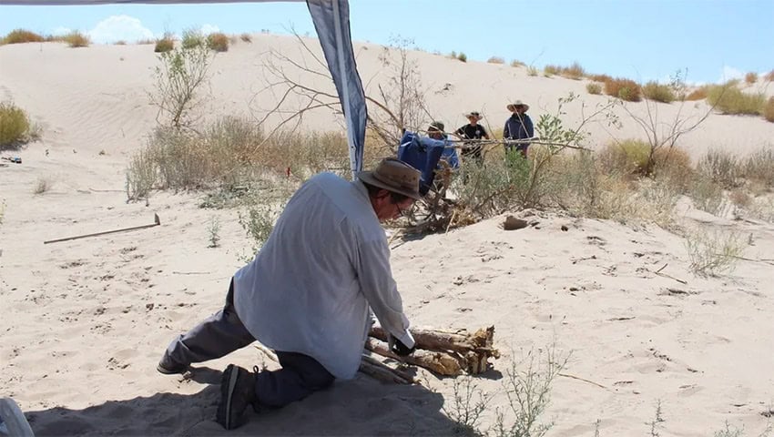 Archaeologists search the sand in the area where the Man of Bilbao's bones were found in Coahuila