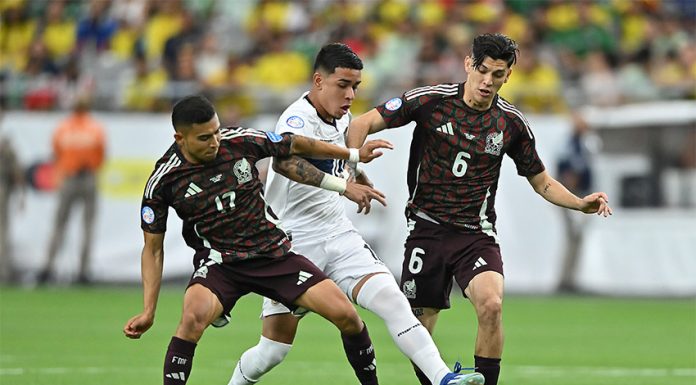 With one goal in three games, Mexico makes a ‘disastrous early exit’ from the Copa América Two Mexican soccer players in red uniforms go after an Ecuadorian player in white with the ball, before Mexico was eliminated from the Copa América.