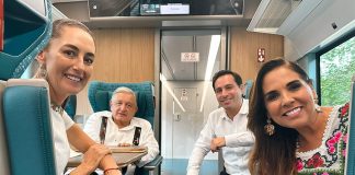 Claudia Sheinbaum, AMLO and Mara Lezama sit in a car of the Maya Train.
